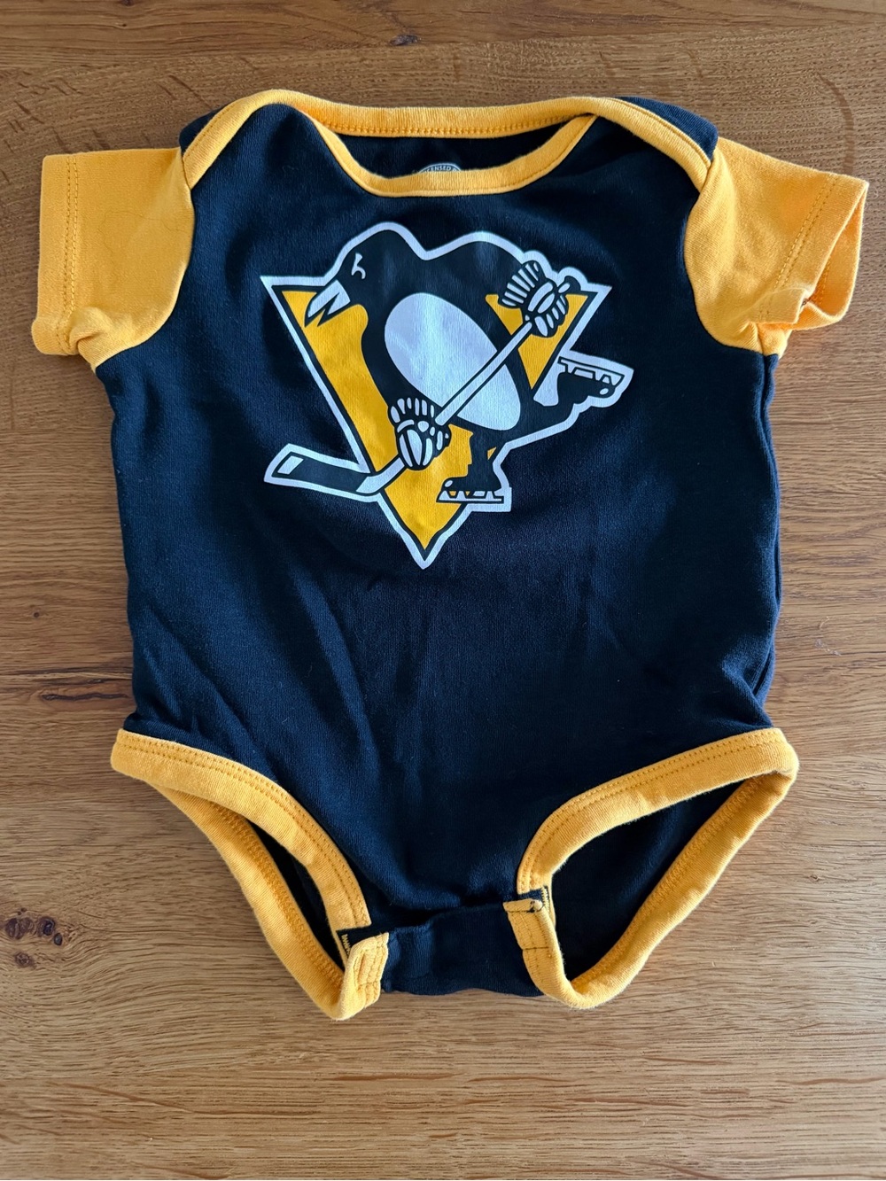 Official NHL Pittsburgh Penguins Baby One-Piece Bodysuit - Black & Gold - 12m